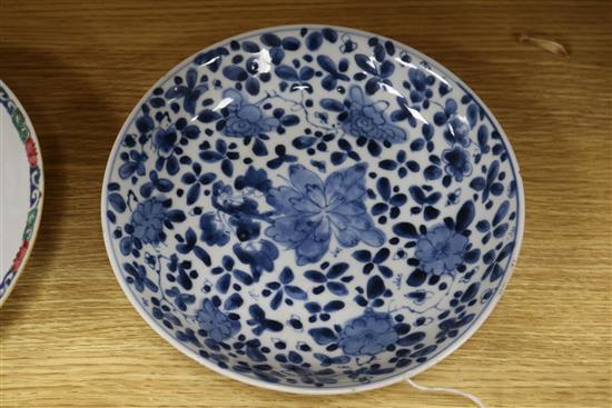 Three Chinese blue and white dishes and a famille rose bowl largest measurement 24cm diameter